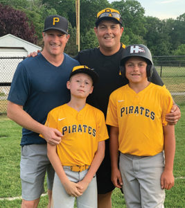 Jonathan Cignetti and Pat Cutter with their sons